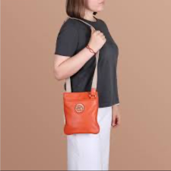 Michael Kors Handbags - EUC Michael Kors Orange Pebbled Leather Crossbody Bag